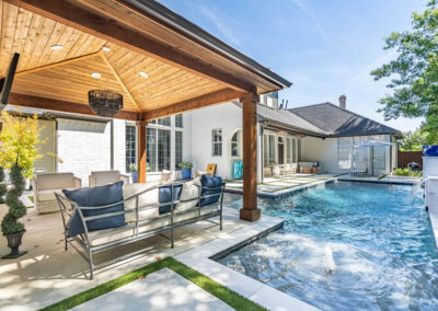 a pool and outdoor living space in plano texas