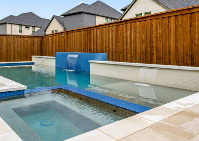 raised wall with sheer descents in a pool in allen texas